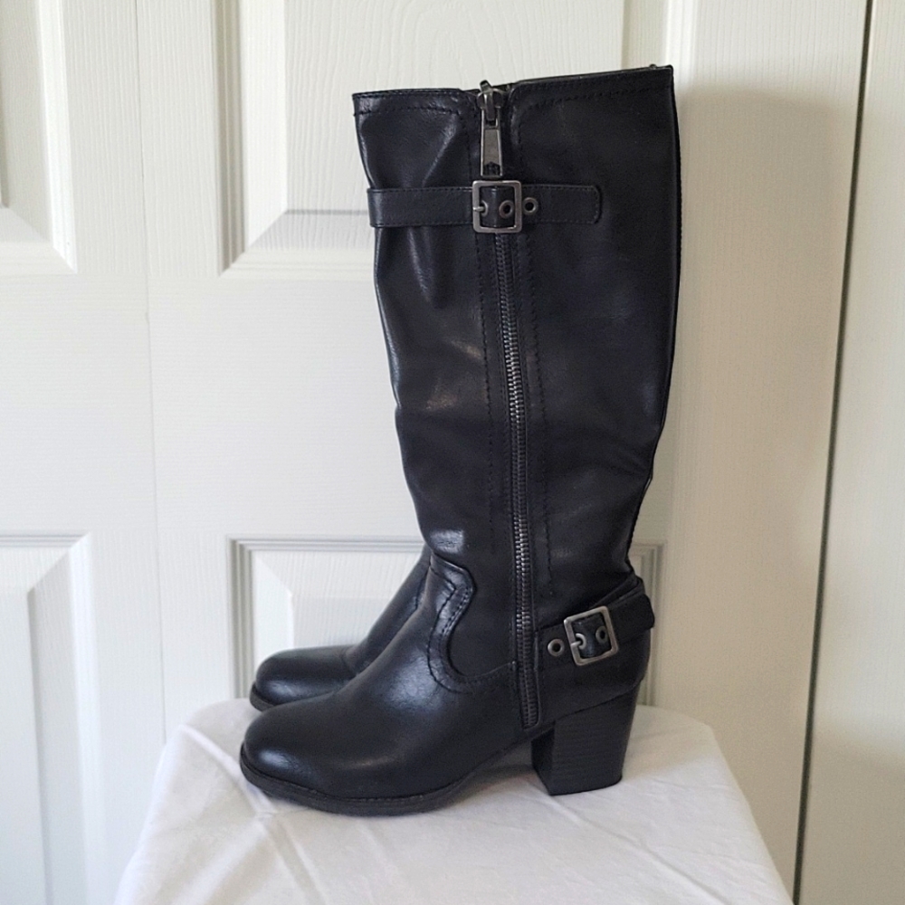 Black boots with zipper and buckle details. Size 8.